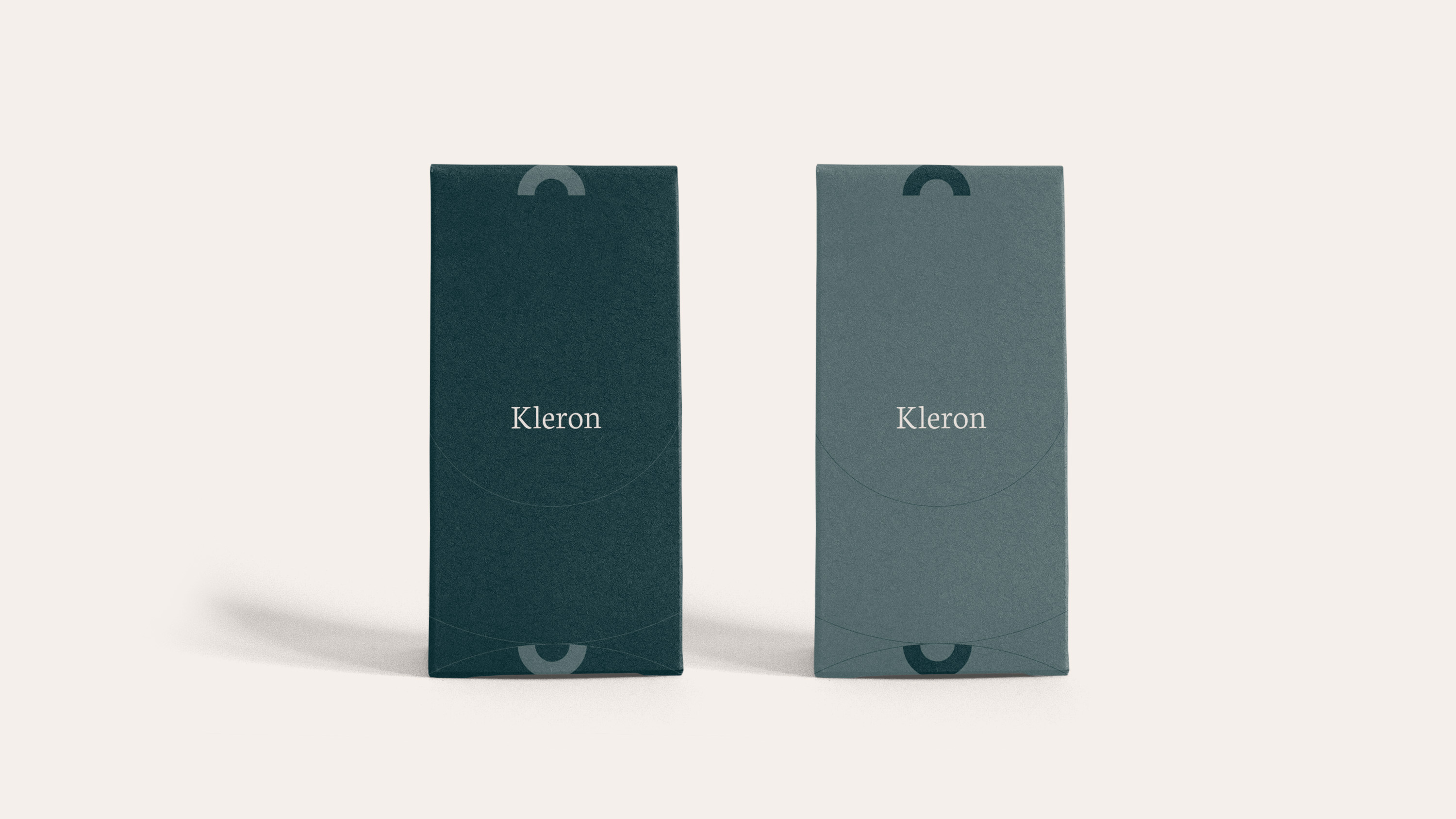 The Extended kit — two Kleron boxes, one dark teal and one lighter slate.